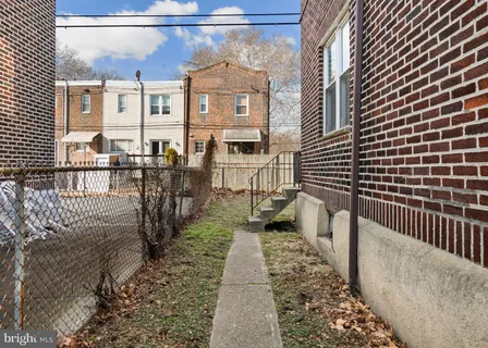 a view of a porch with wooden floor