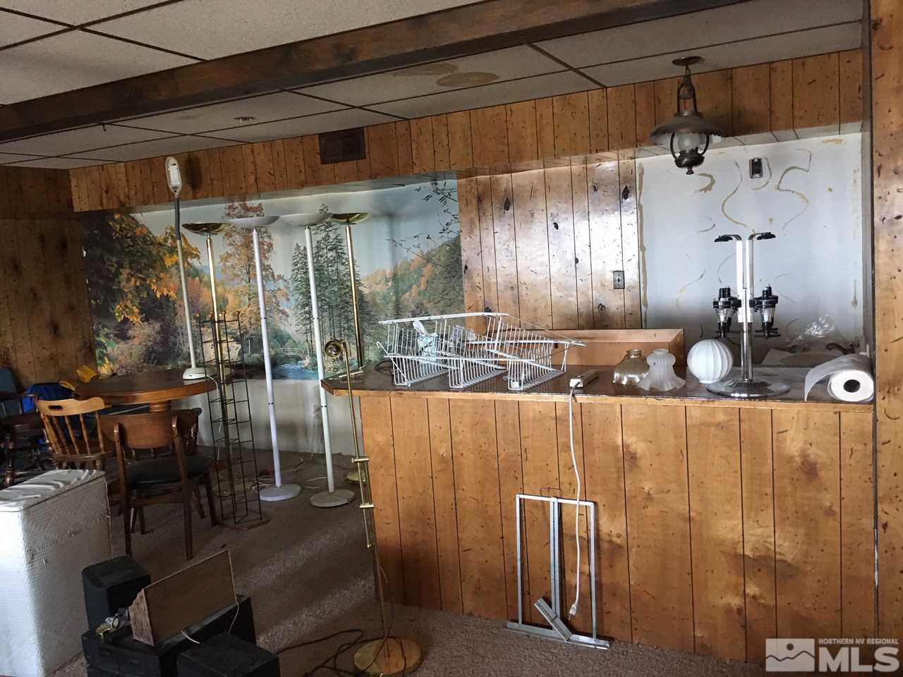 4305 Drake Way Washoe Valley, NV 89704 - Photo 13 of 21 a kitchen with a table and chairs