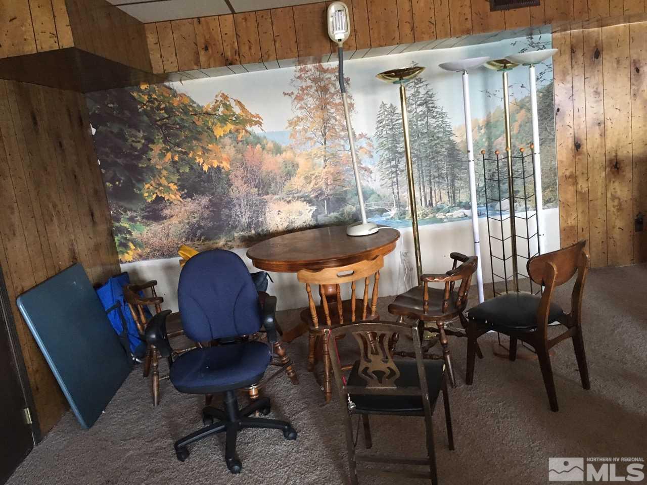 4305 Drake Way Washoe Valley, NV 89704 - Photo 14 of 21 a view of a dining room with furniture window and outside view