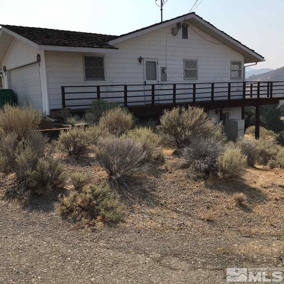 4305 Drake Way Washoe Valley, NV 89704 - Photo 16 of 21 a backyard of a house with lots of green space