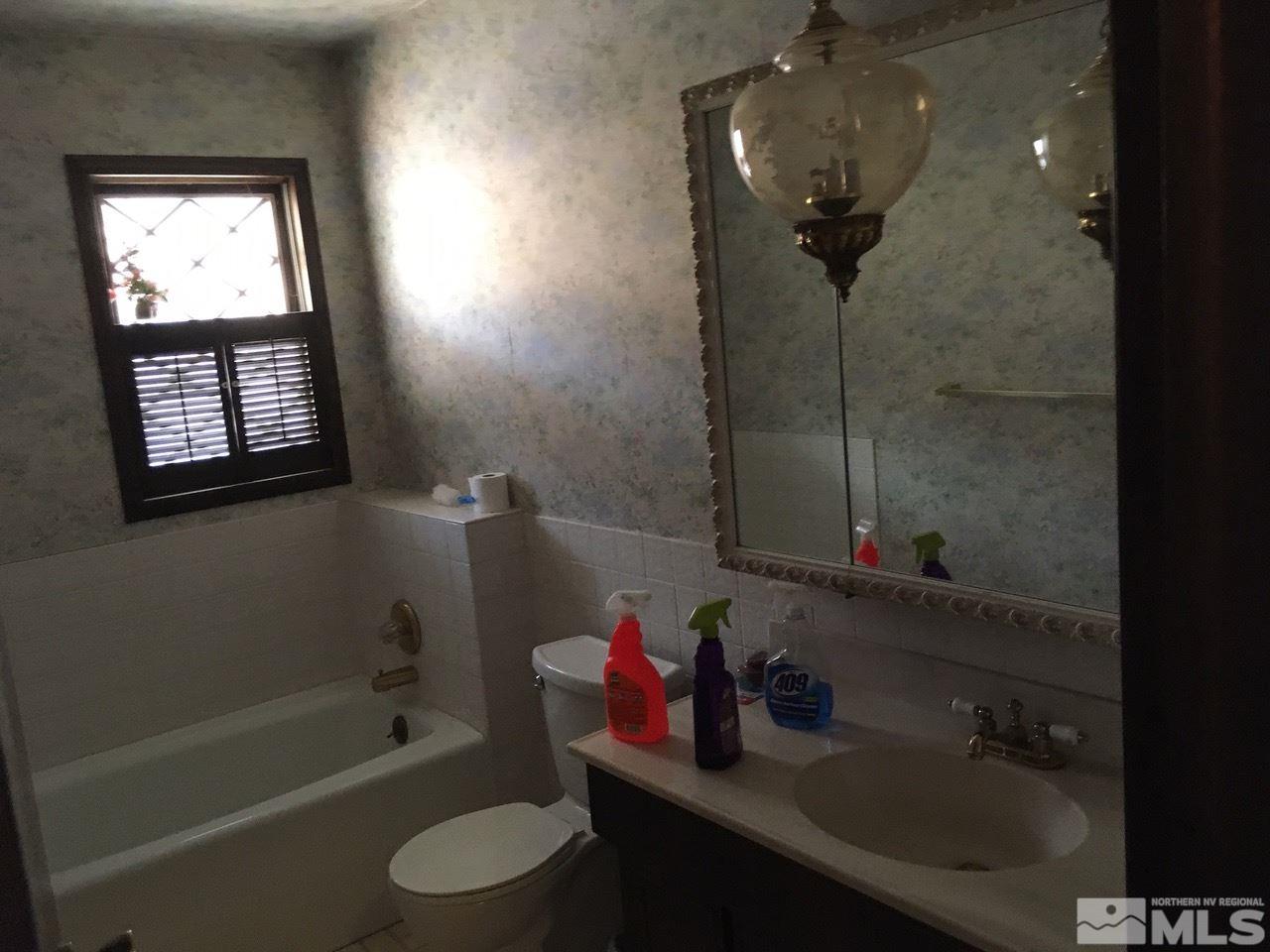 4305 Drake Way Washoe Valley, NV 89704 - Photo 6 of 21 a bathroom with a sink toilet tub and shower