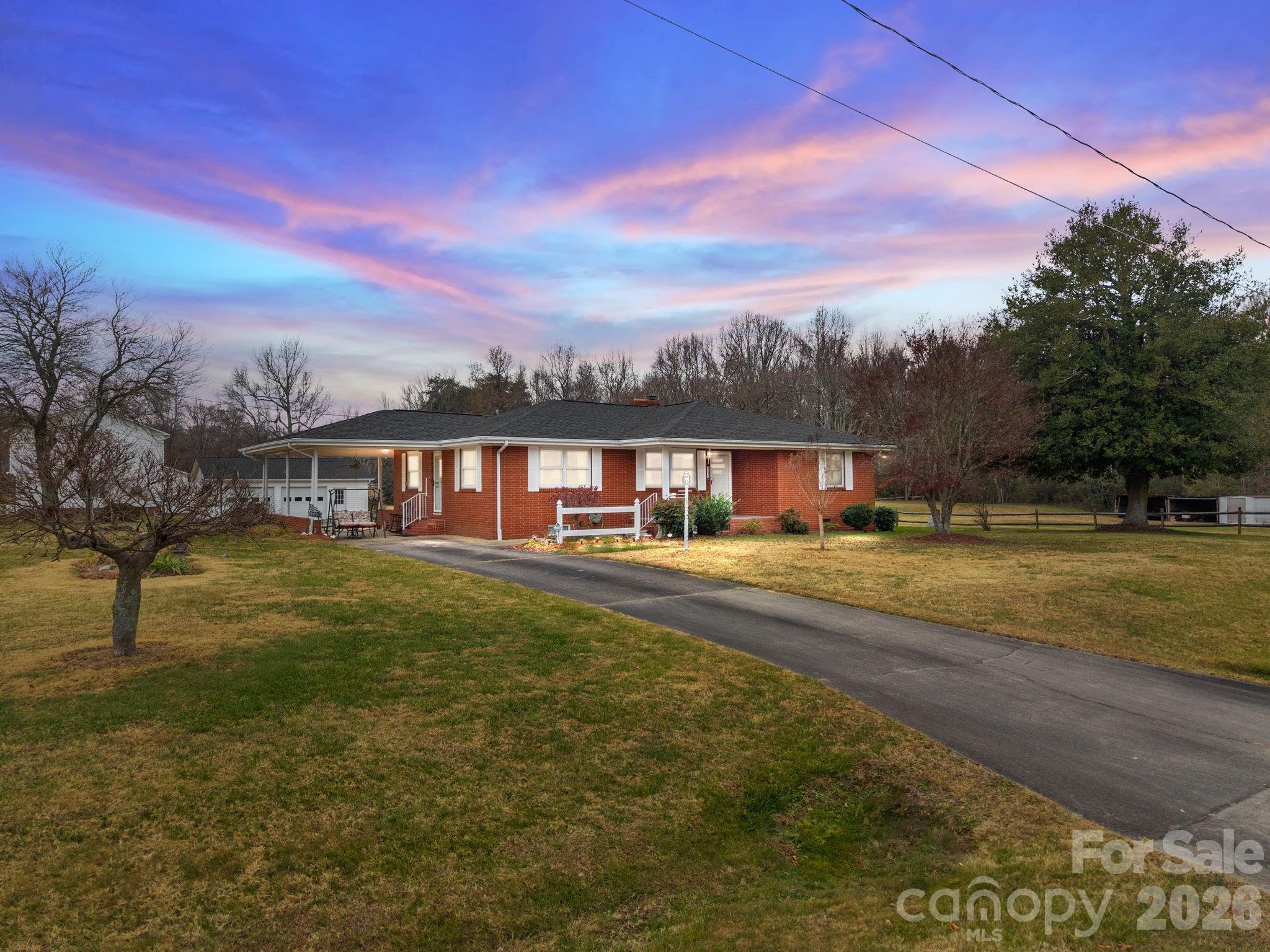 2050 Lake Road Salisbury, NC 28146 - Photo 1 of 41 a view of a house with a big yard