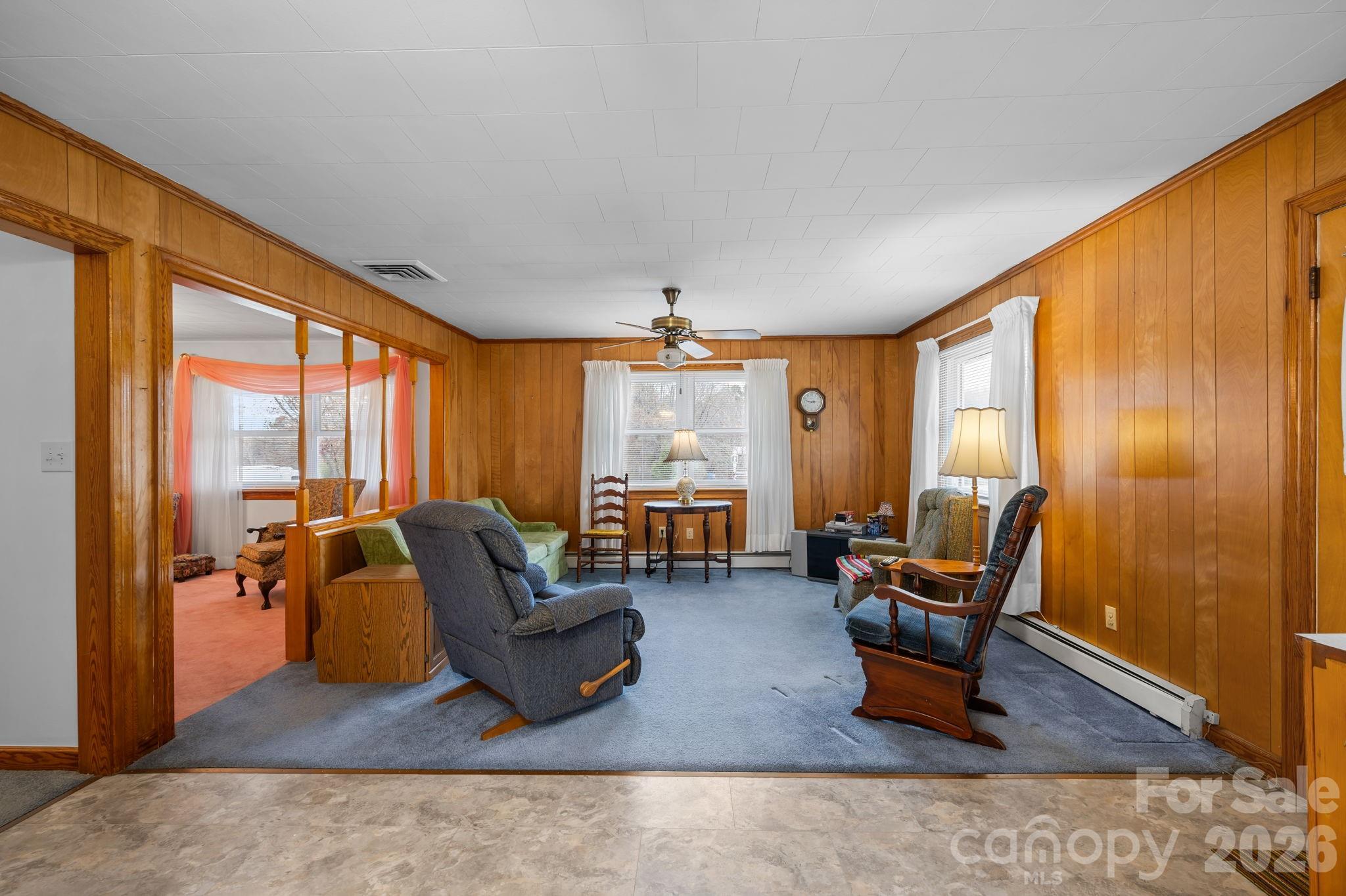 2050 Lake Road Salisbury, NC 28146 - Photo 11 of 41 a living room with furniture and large windows