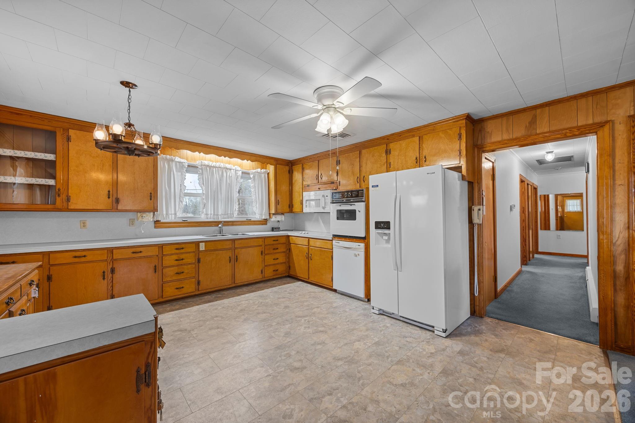 2050 Lake Road Salisbury, NC 28146 - Photo 12 of 41 a kitchen with refrigerator and window