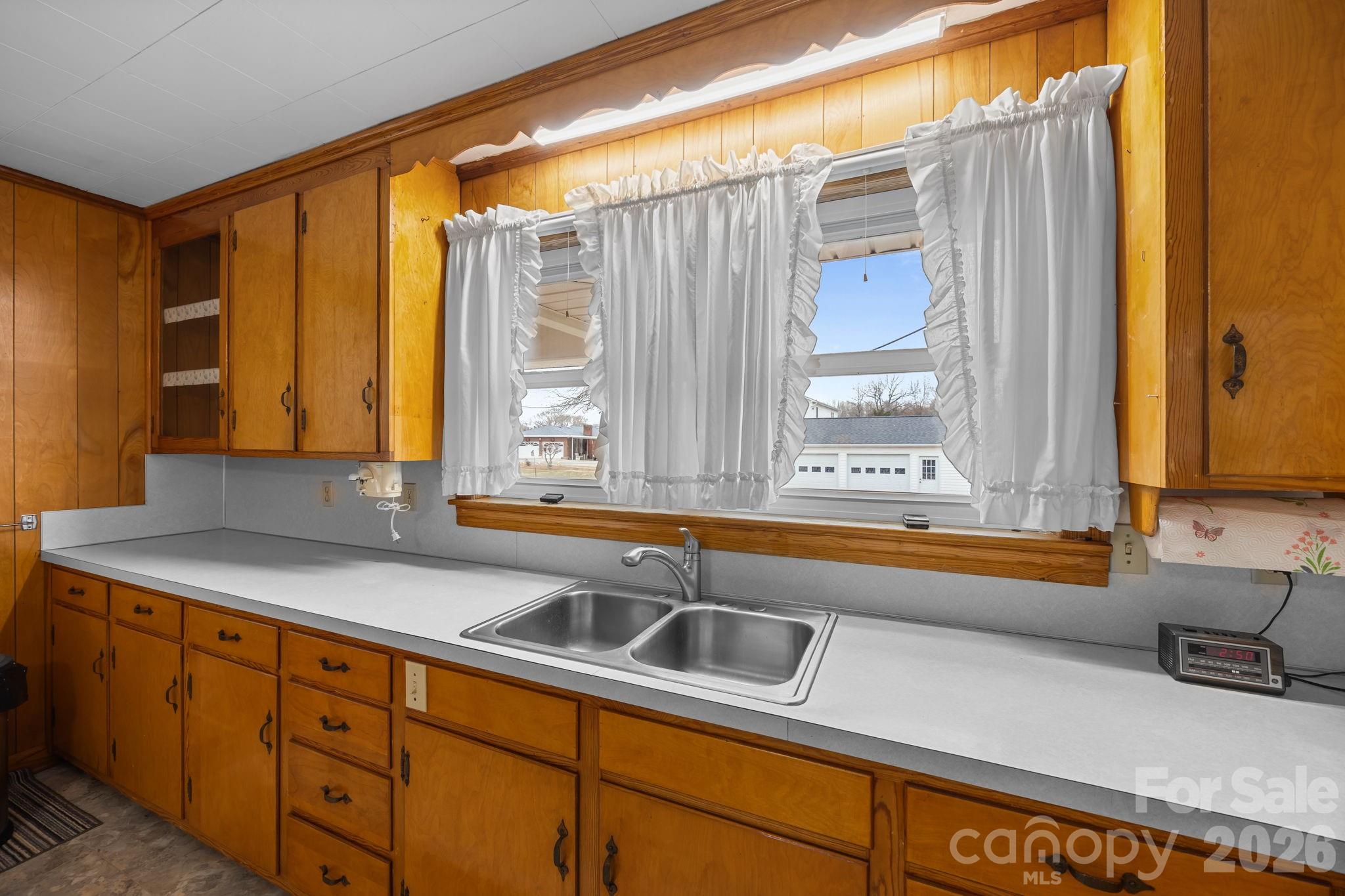 2050 Lake Road Salisbury, NC 28146 - Photo 15 of 41 a kitchen that has a sink and a window