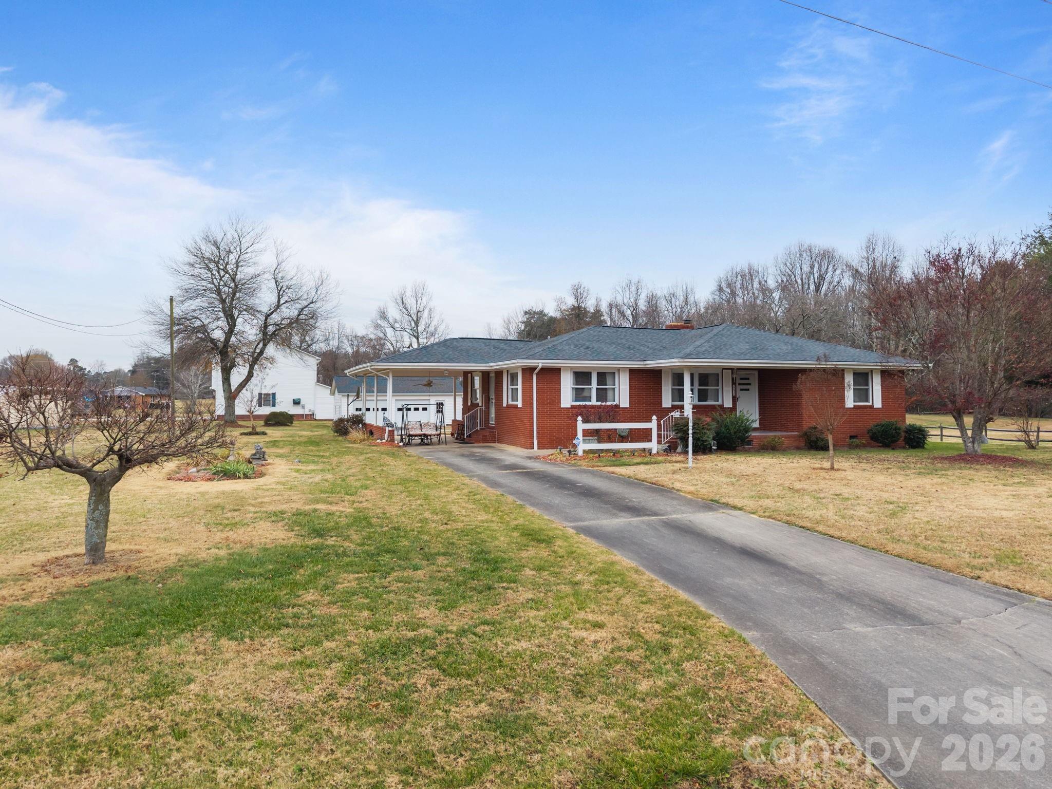 2050 Lake Road Salisbury, NC 28146 - Photo 2 of 41 a view of a house with a yard