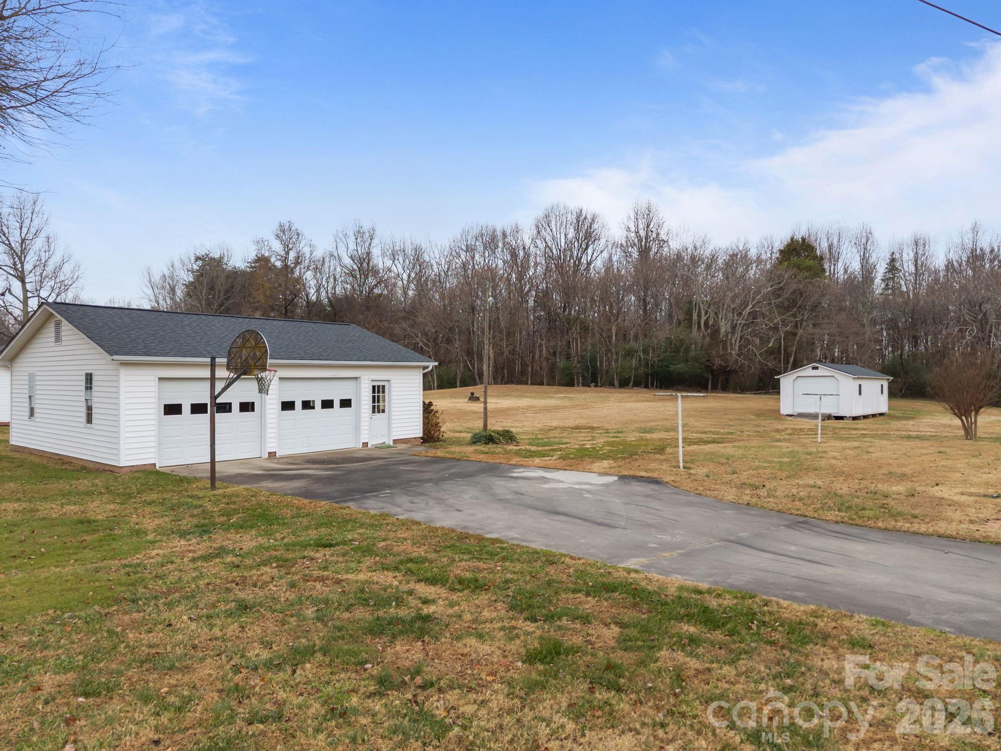 2050 Lake Road Salisbury, NC 28146 - Photo 29 of 41 a view of a house with a yard