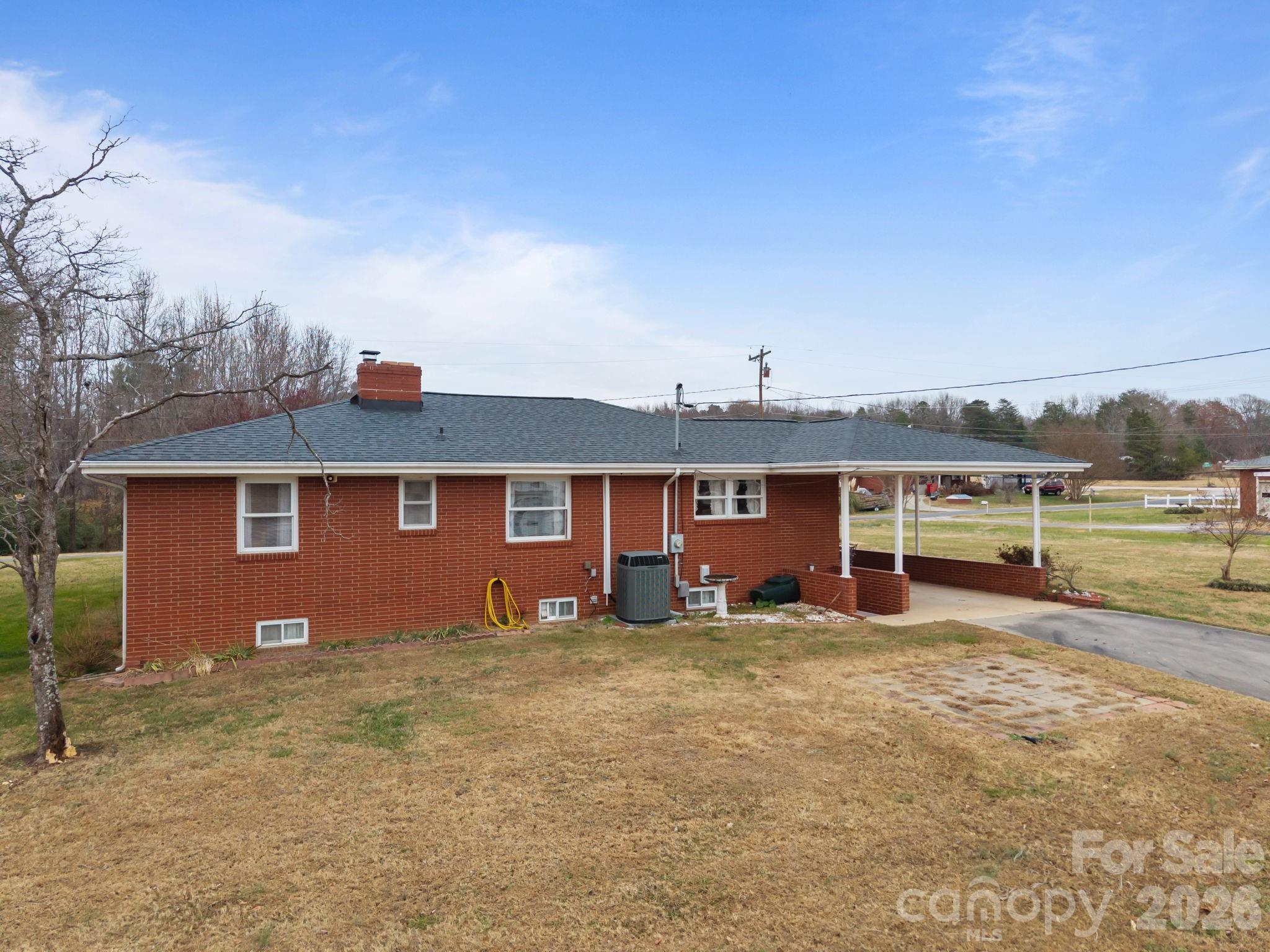 2050 Lake Road Salisbury, NC 28146 - Photo 34 of 41 front view of a house with a yard