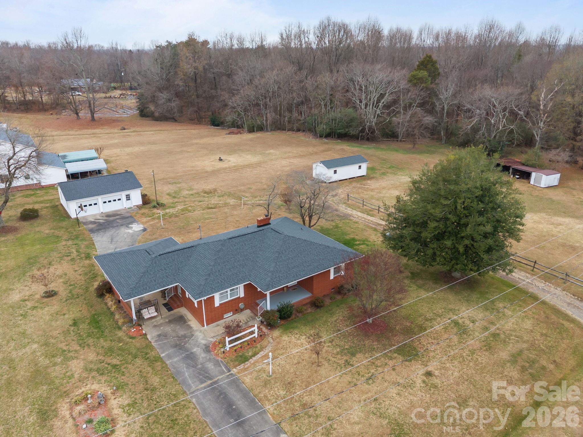 2050 Lake Road Salisbury, NC 28146 - Photo 40 of 41 an aerial view of a house with mountain view