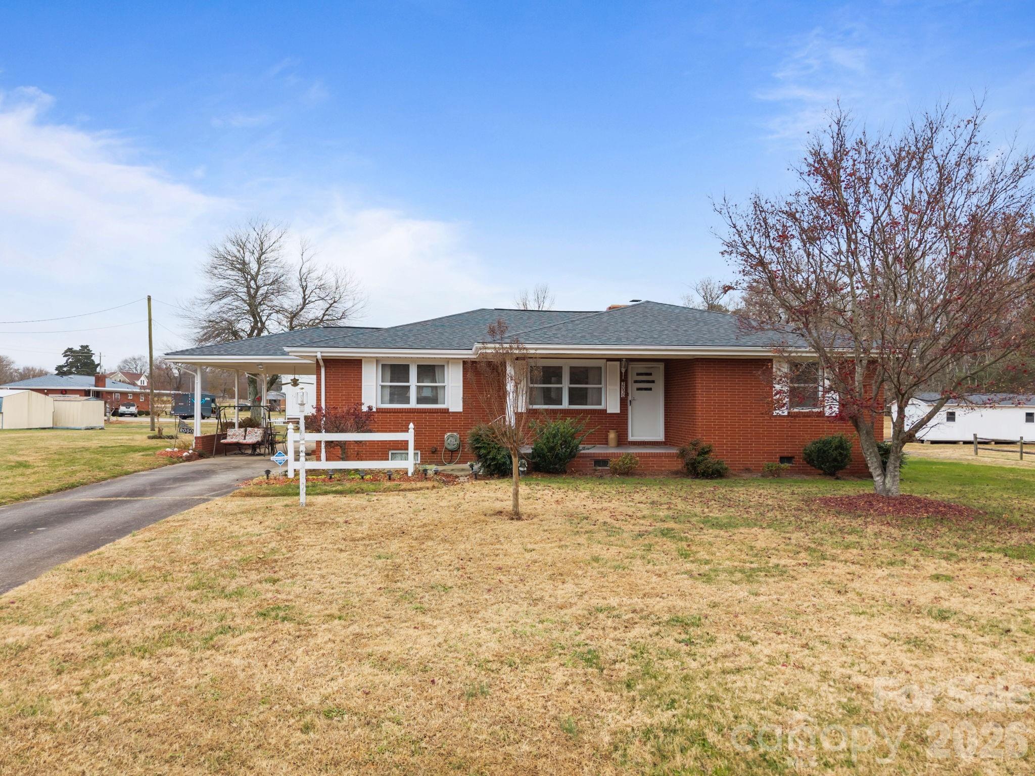 2050 Lake Road Salisbury, NC 28146 - Photo 4 of 41 a view of a house with a yard