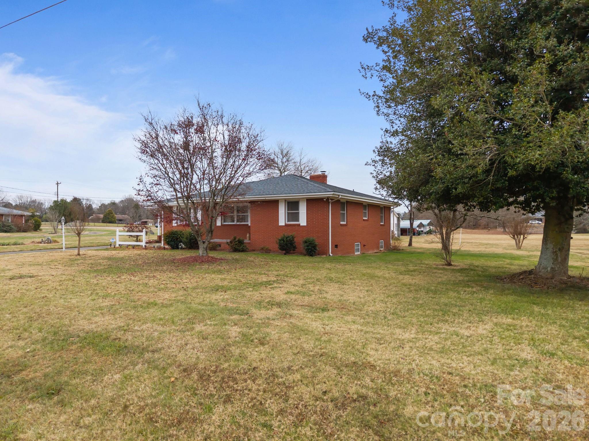 2050 Lake Road Salisbury, NC 28146 - Photo 6 of 41 a view of a house with a yard