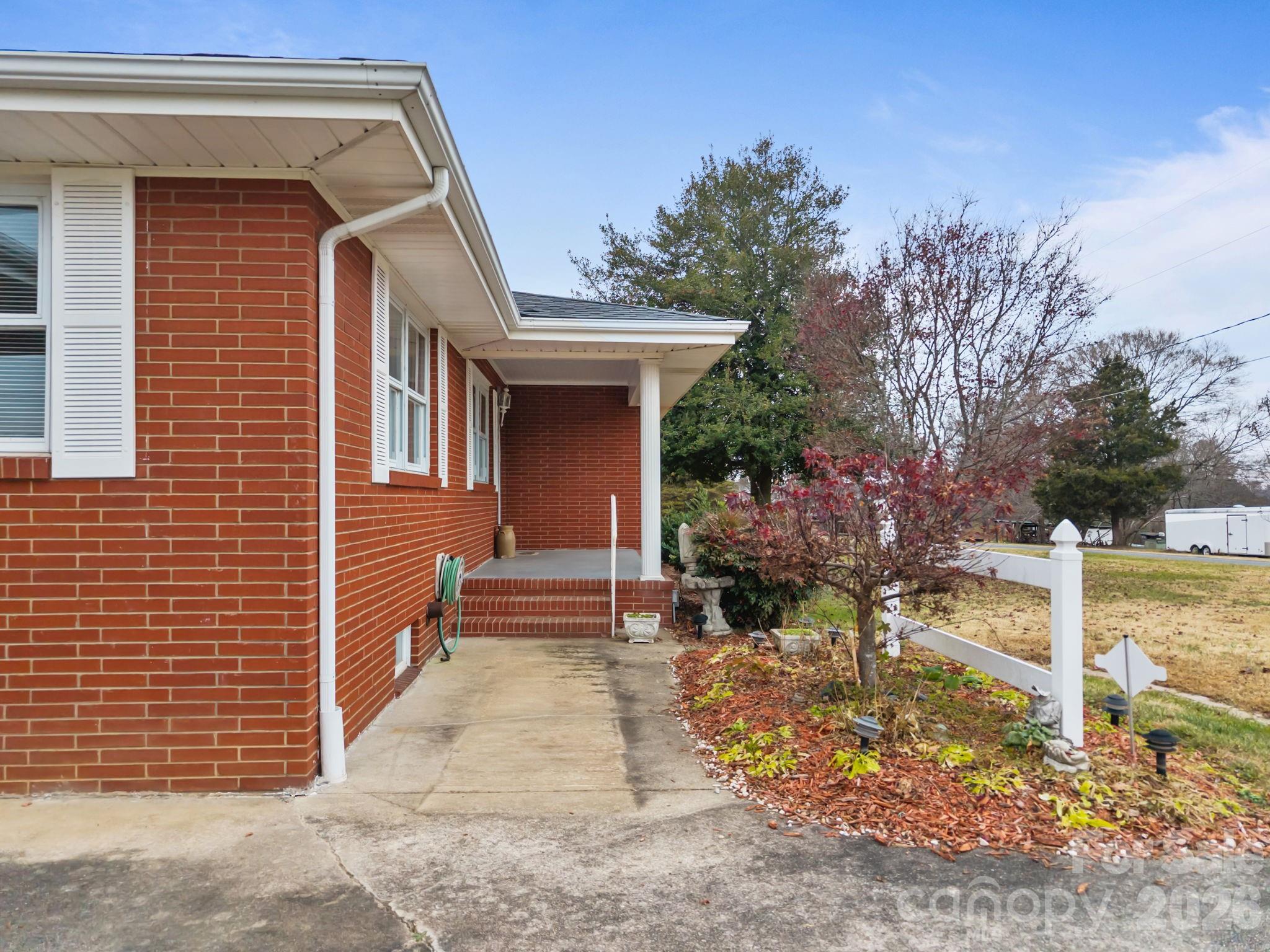2050 Lake Road Salisbury, NC 28146 - Photo 7 of 41 a view of a house with a yard