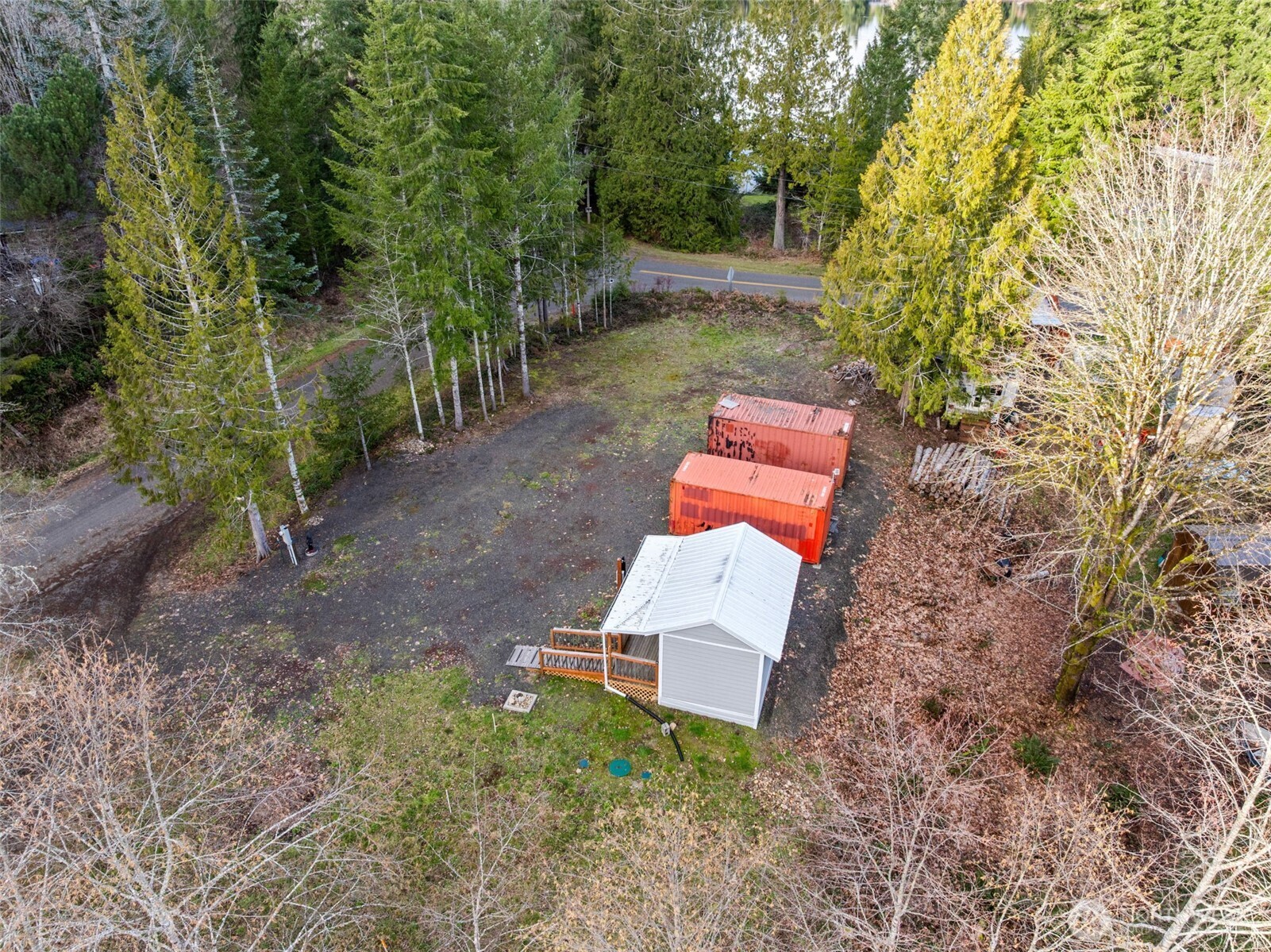 21 West Prairie Loop Road Elma, WA 98541 - Photo 11 of 40 a backyard of a house with outdoor seating