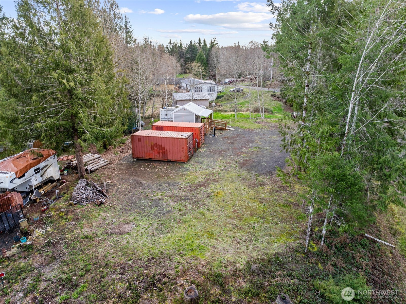 21 West Prairie Loop Road Elma, WA 98541 - Photo 13 of 40 a view of a backyard with sitting area