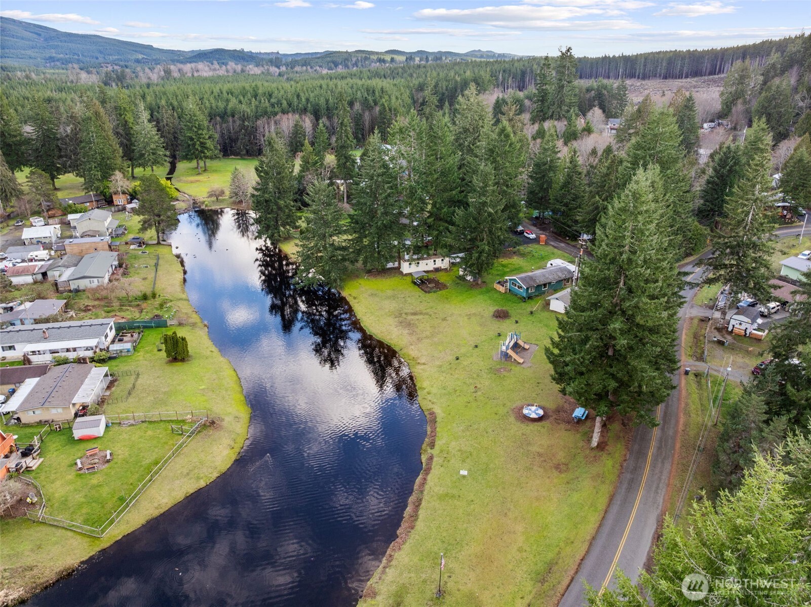 21 West Prairie Loop Road Elma, WA 98541 - Photo 28 of 40 a view of a swimming pool with a yard