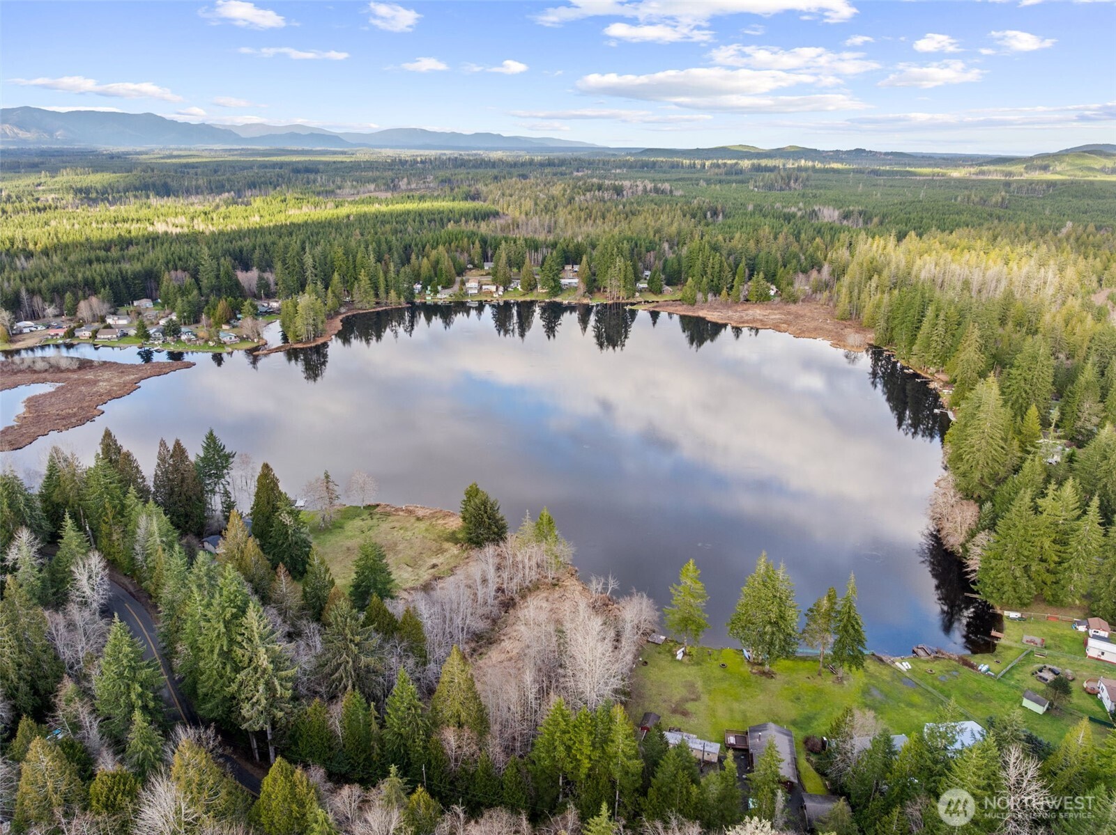 21 West Prairie Loop Road Elma, WA 98541 - Photo 31 of 40 a view of a lake with a mountain in the back