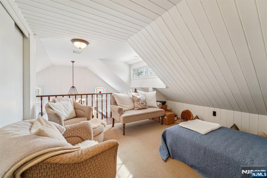 406 Indian Road Wayne, NJ 07470 - Photo 24 of 41 a living room with furniture and stairs