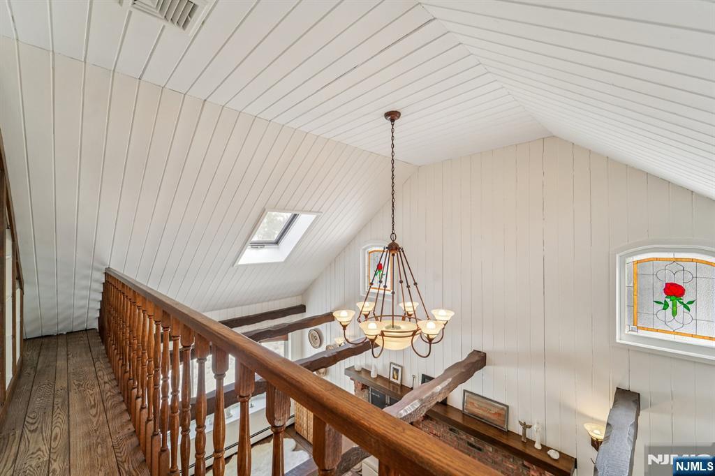 406 Indian Road Wayne, NJ 07470 - Photo 25 of 41 a view of a livingroom with furniture and staircase