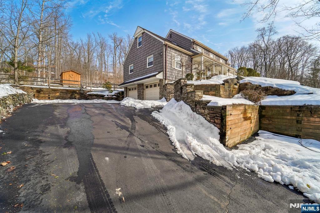 406 Indian Road Wayne, NJ 07470 - Photo 3 of 41 a view of a street with houses