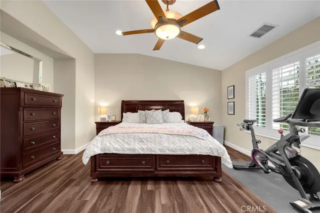 a bed room with a bed and a window