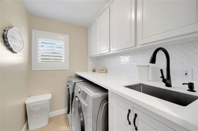 a view of pool with lawn chairs and couches