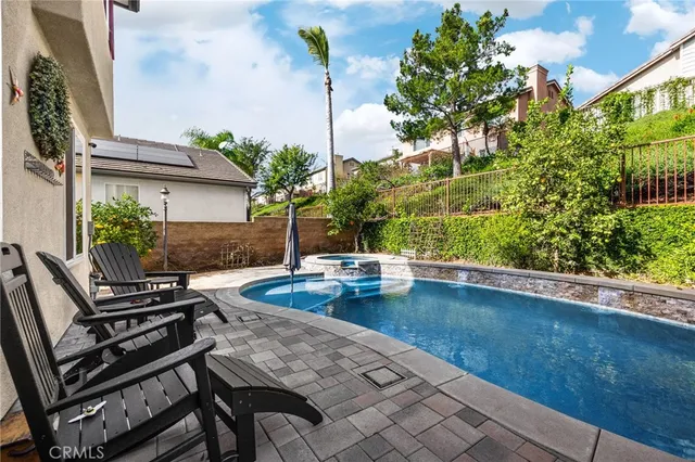 a picture of a brick house with a outdoor space