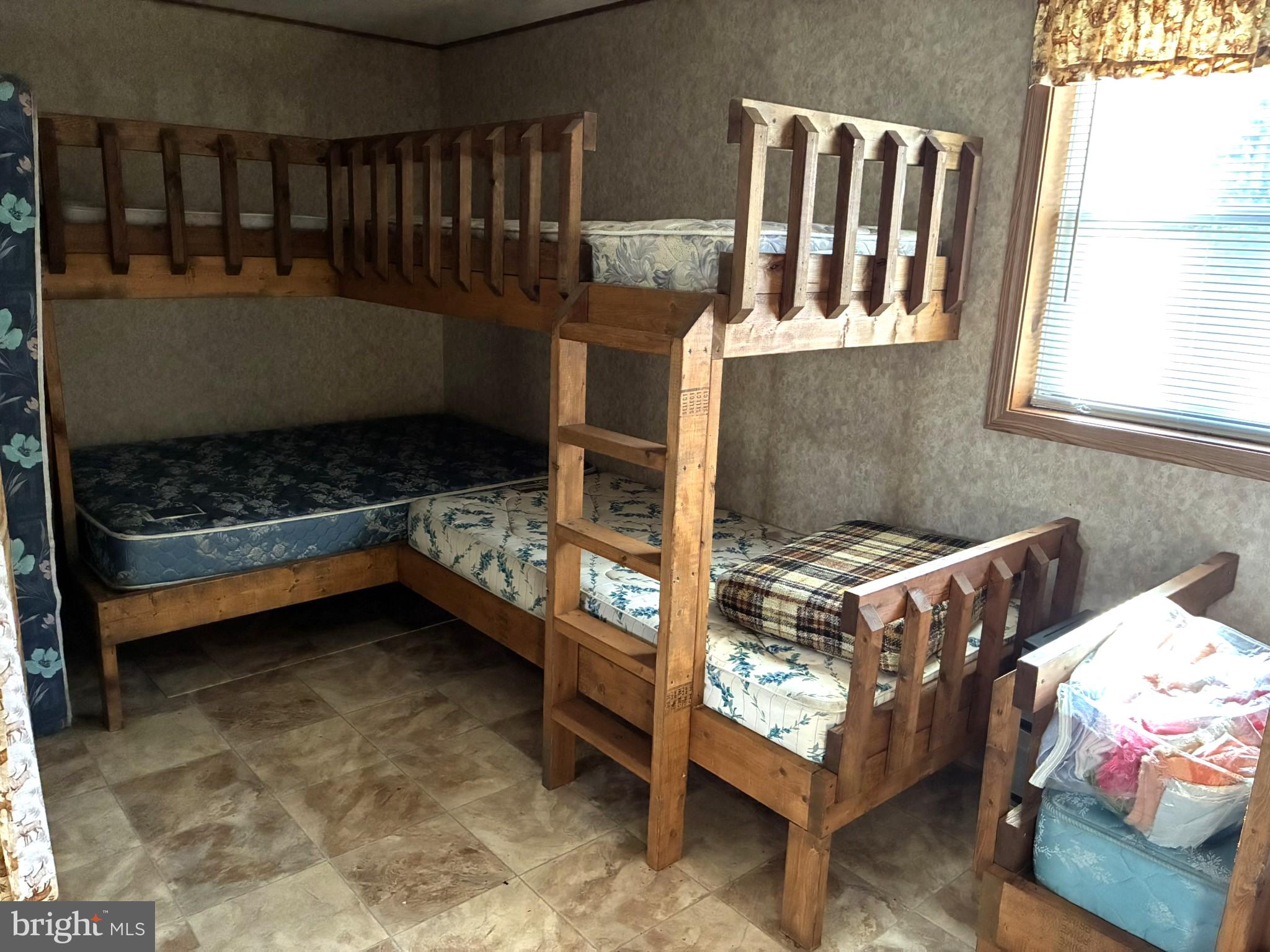 807 Sand Spring Road Beech Creek, PA 16822 - Photo 11 of 30 Cozy bunk beds for shared spaces.