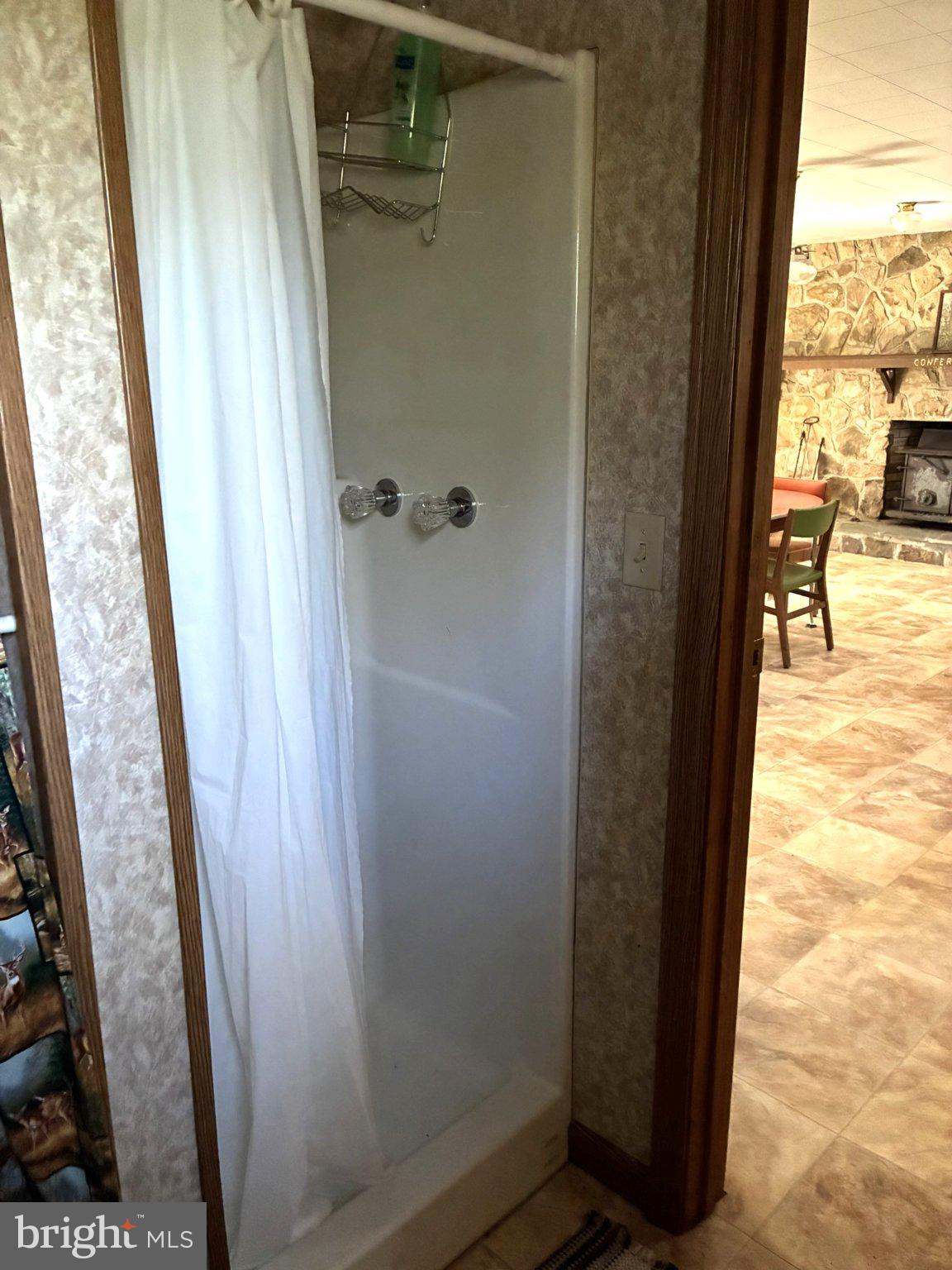 807 Sand Spring Road Beech Creek, PA 16822 - Photo 15 of 30 Cozy shower nook in a rustic home.