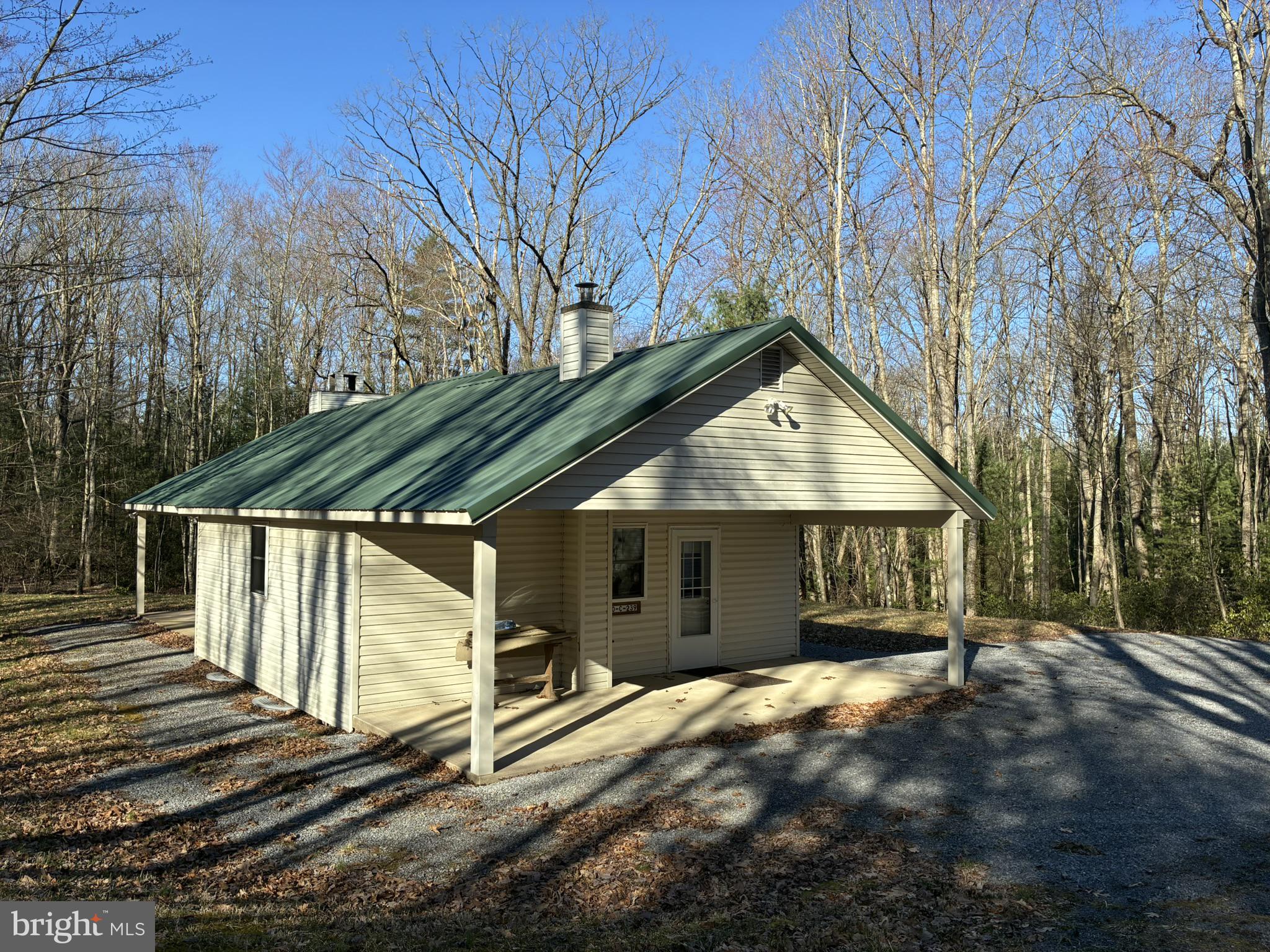 807 Sand Spring Road Beech Creek, PA 16822 - Photo 27 of 30 Charming retreat in wooded serenity.