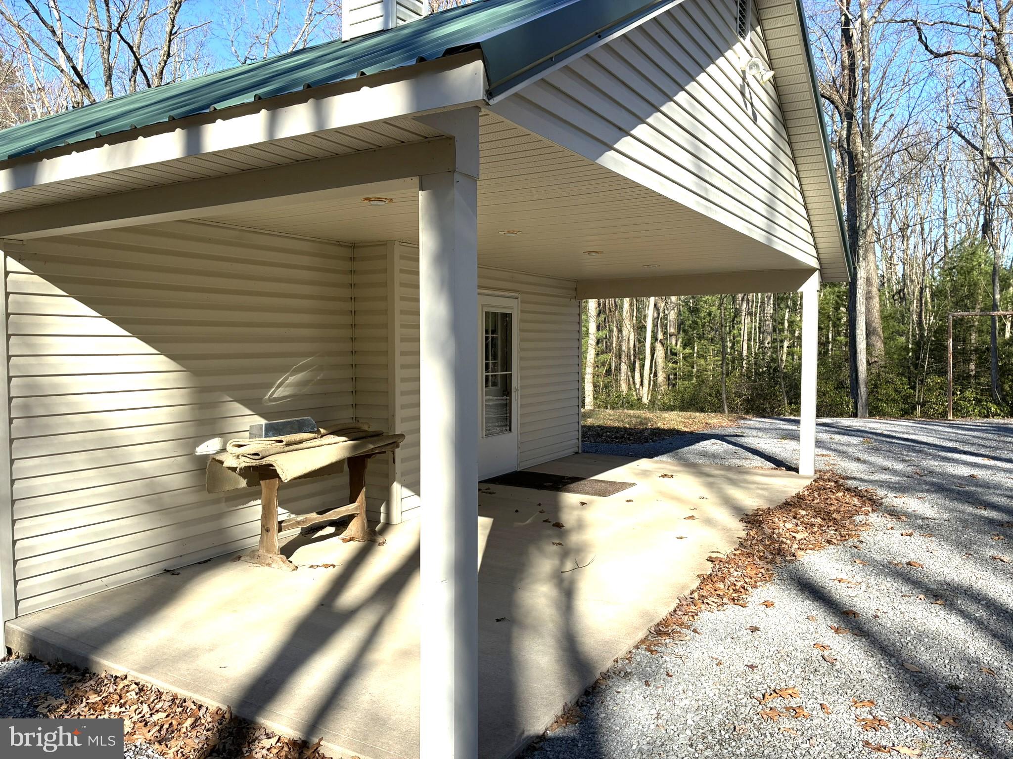 807 Sand Spring Road Beech Creek, PA 16822 - Photo 29 of 30 Charming porch in a wooded retreat.