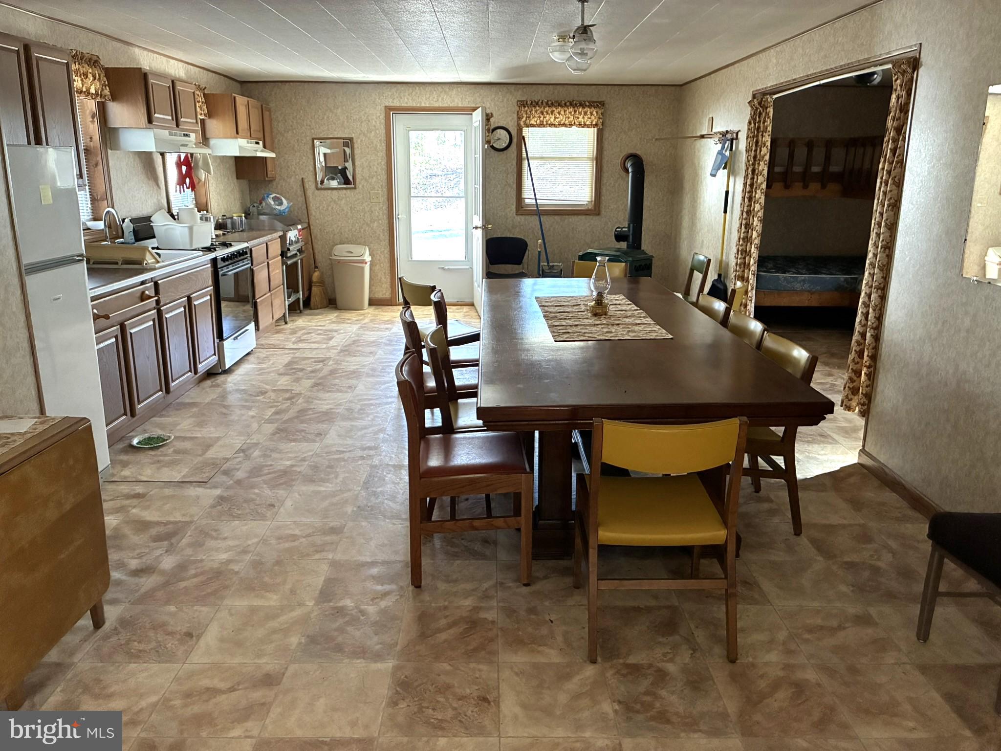 807 Sand Spring Road Beech Creek, PA 16822 - Photo 5 of 30 Spacious kitchen with dining area.