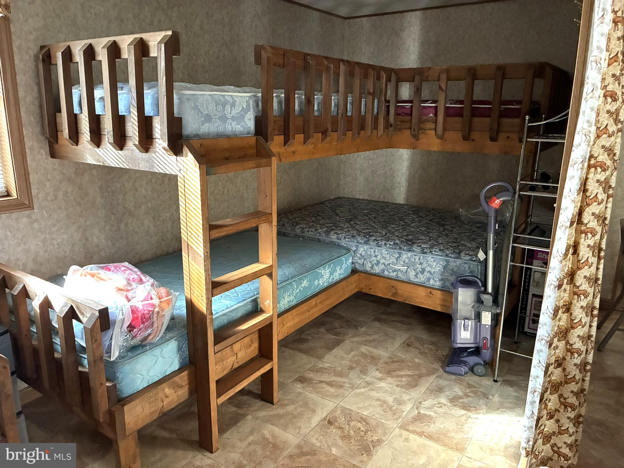 807 Sand Spring Road Beech Creek, PA 16822 - Photo 10 of 30 Cozy bunk beds for shared spaces.