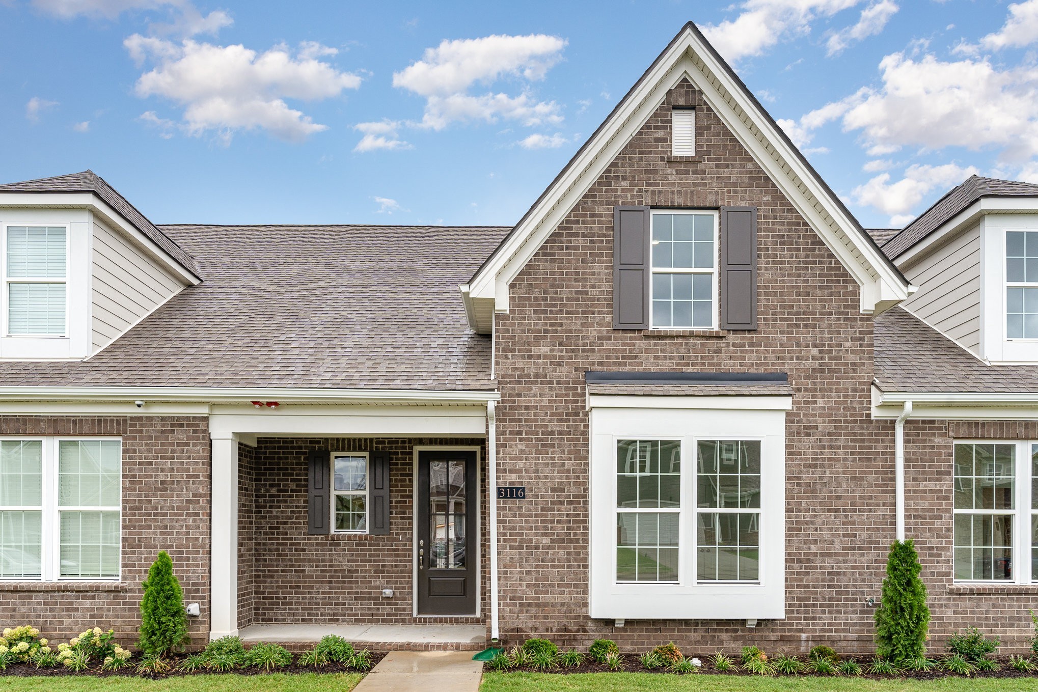 3116 Arbor Valley Rd Spring Hill Spring Hill, TN 37174 - Photo 1 of 43 a front view of a house with a yard