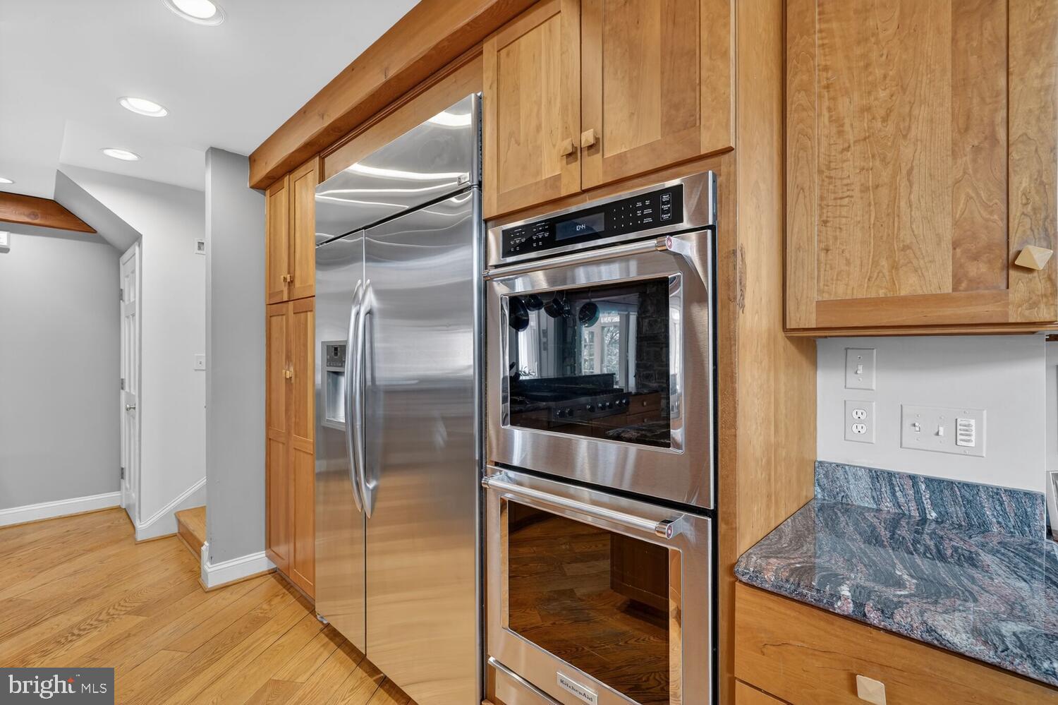3201 Tennyson Street Northwest Washington, DC 20015 - Photo 11 of 52 a kitchen with granite countertop cabinets and steel stainless steel appliances