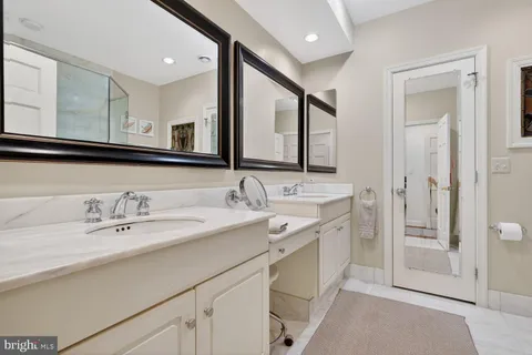 a bedroom with a bed and a cabinets