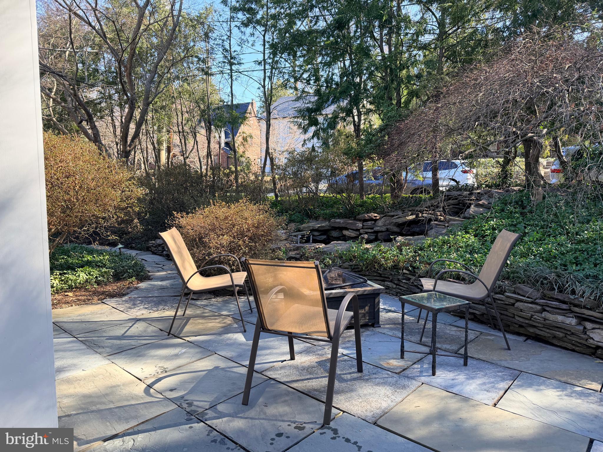 3201 Tennyson Street Northwest Washington, DC 20015 - Photo 44 of 52 a backyard of a house with table and chairs