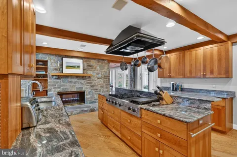a kitchen with a stove and a microwave
