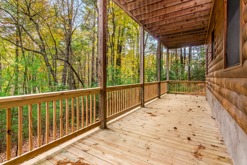 125 Waters Road Ellijay, GA 30536 - Photo 39 of 68 a view of balcony with wooden floor and fence