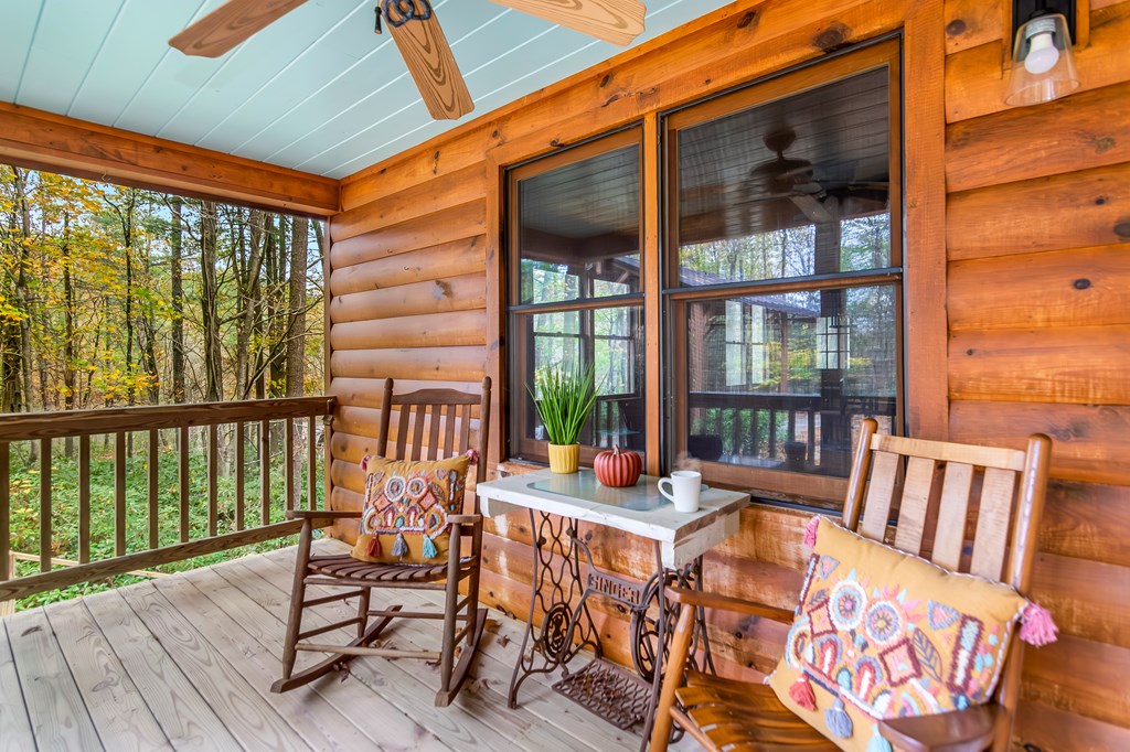 125 Waters Road Ellijay, GA 30536 - Photo 42 of 68 a outdoor space with patio the couches and chairs
