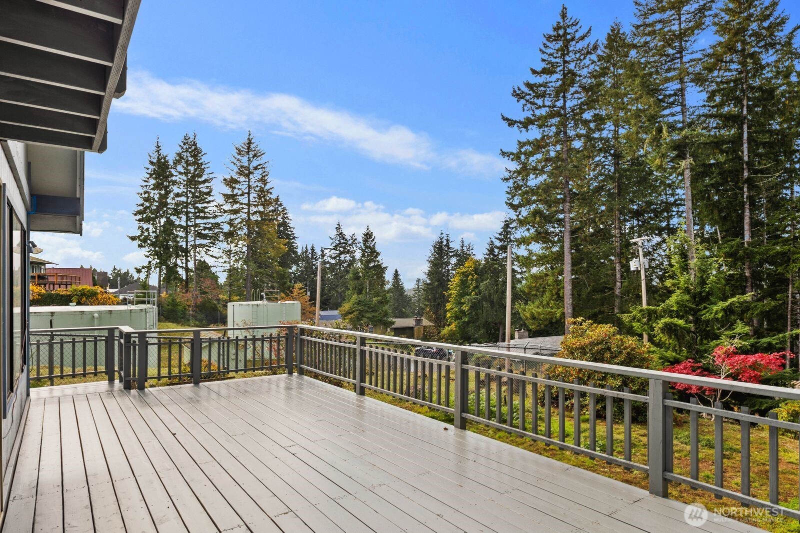 350 East Olympic Drive Grapeview, WA 98546 - Photo 30 of 40 a view of a balcony with wooden floor