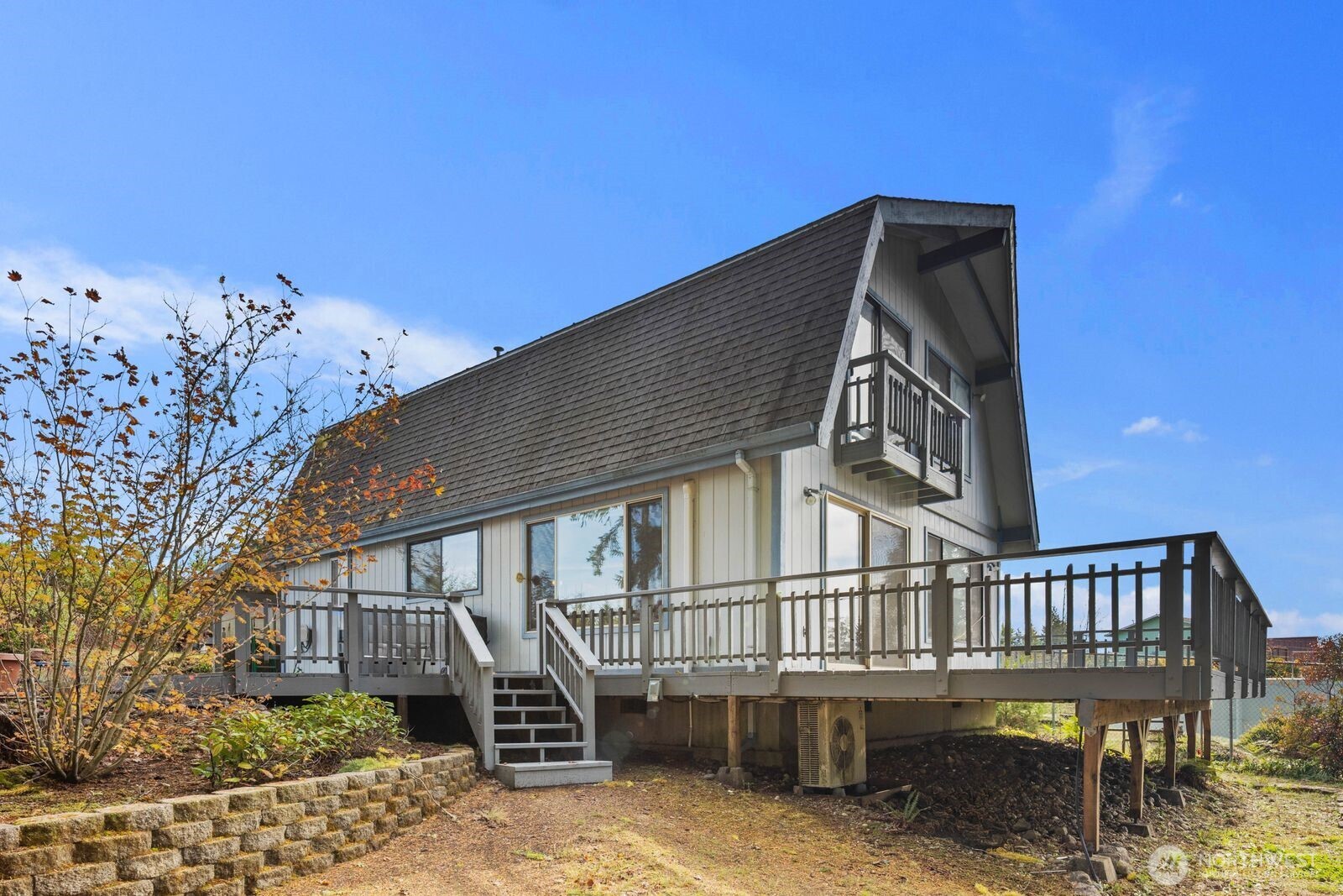 350 East Olympic Drive Grapeview, WA 98546 - Photo 33 of 40 a view of a wooden chair and table in the terrace