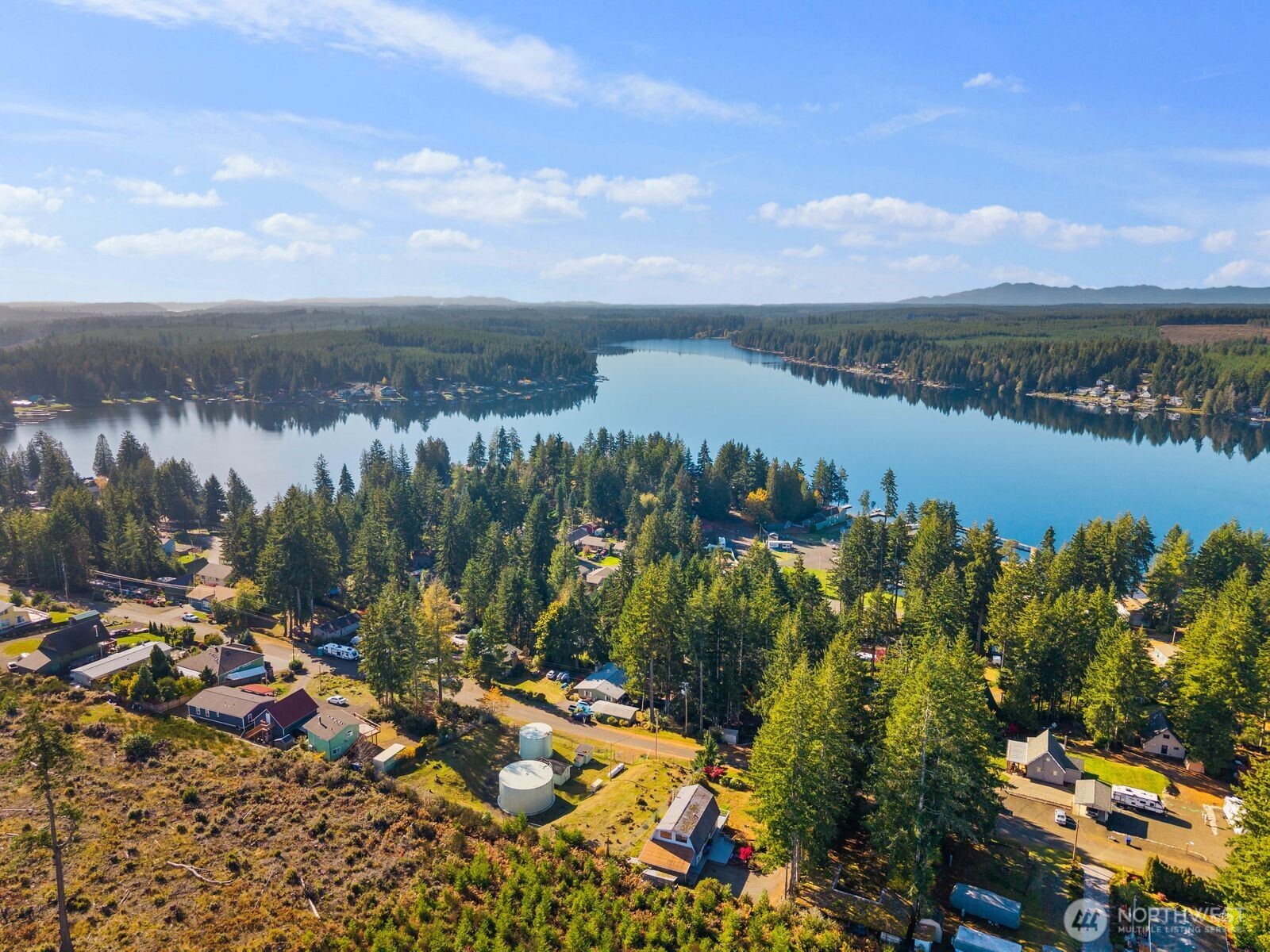 350 East Olympic Drive Grapeview, WA 98546 - Photo 38 of 40 a view of a lake with a city