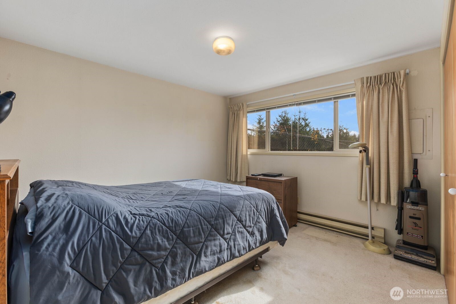 350 East Olympic Drive Grapeview, WA 98546 - Photo 10 of 40 a bedroom with a bed and window