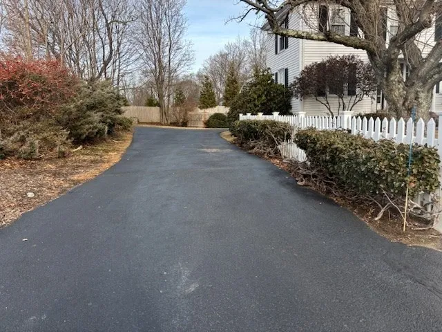 a view of a street with some trees