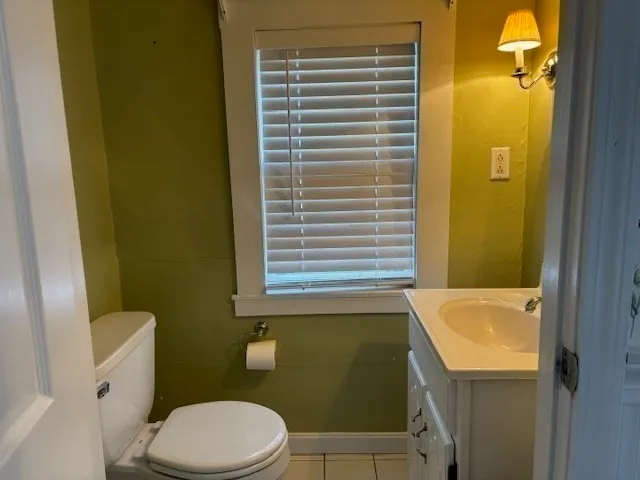 a bathroom with a sink and toilet