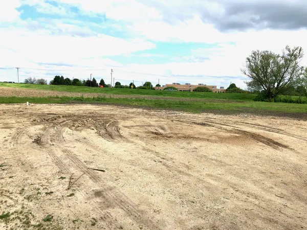 a view of a lake with a big yard