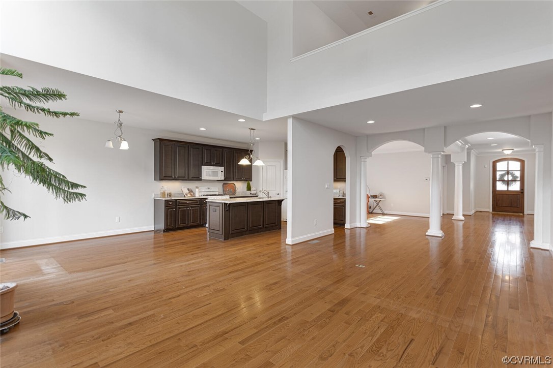 488 Bel Bridge Circle Midlothian, VA 23113 - Photo 16 of 38 a view of a kitchen with a sink and a fireplace
