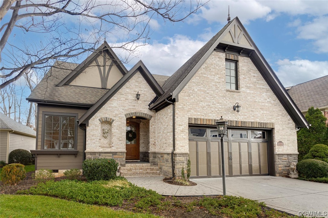 488 Bel Bridge Circle Midlothian, VA 23113 - Photo 2 of 38 a front view of a house with garden