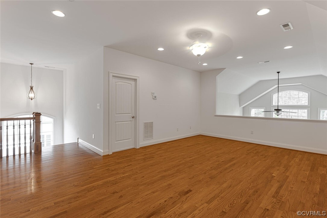 488 Bel Bridge Circle Midlothian, VA 23113 - Photo 30 of 38 a view of an empty room with wooden floor and a window