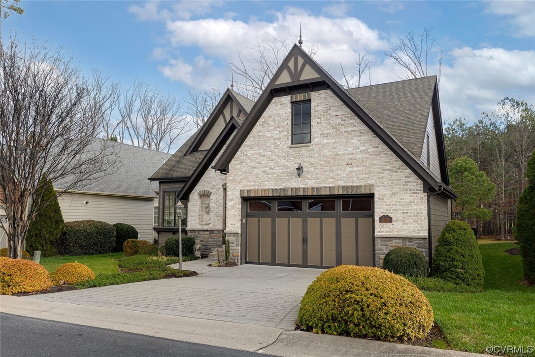 488 Bel Bridge Circle Midlothian, VA 23113 - Photo 3 of 38 a front view of a house with a yard and garage